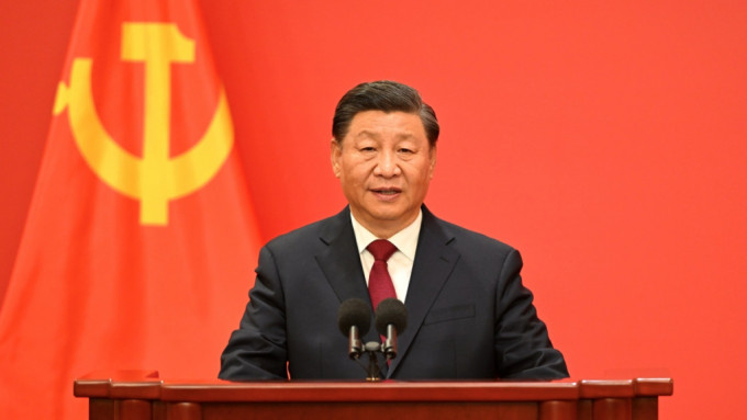 习近平连任总书记及军委主席，强调与人民风雨同舟
