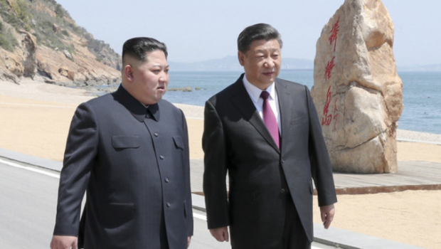 习近平向金正恩发回电