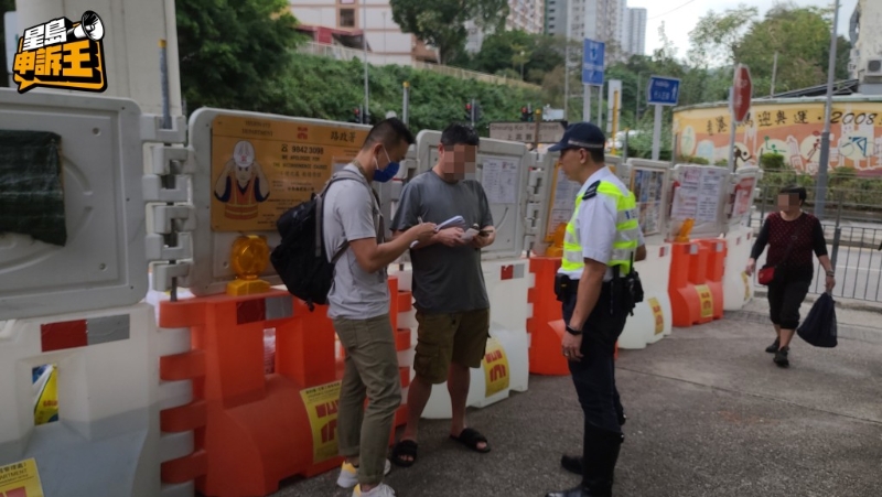 市民何先生(图中灰色衫)表示:“捉过一次唔敢再乱过马路!” 市民何先生(图中灰色衫)表示:“捉过一次唔敢再乱过马路!”