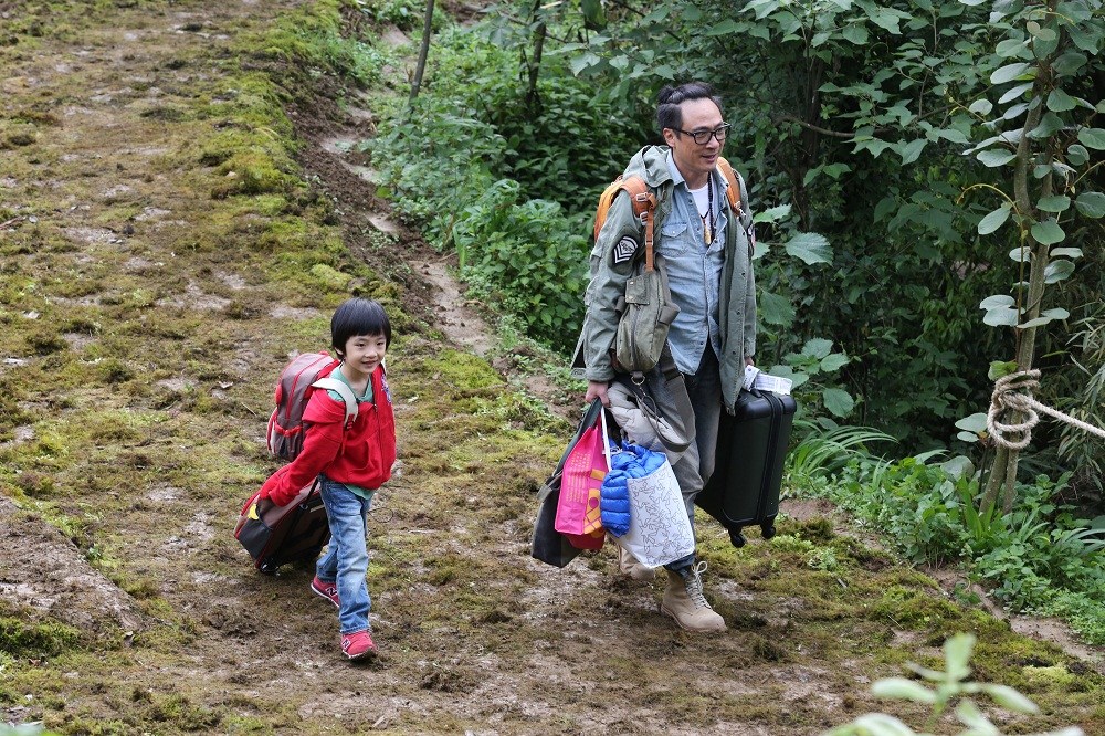 吴镇宇于2014年带5岁的囝囝吴费曼参加内地综艺节目《爸爸去哪儿2》 吴镇宇于2014年带5岁的囝囝吴费曼参加内地综艺节目《爸爸去哪儿2》