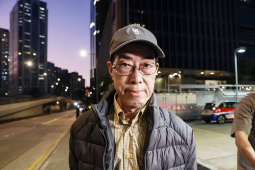 旧主席邓国权离开廉署总部。